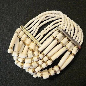 Cream and‎ gold multi strand beaded stretch bracelet